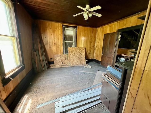 interior space featuring ceiling fan