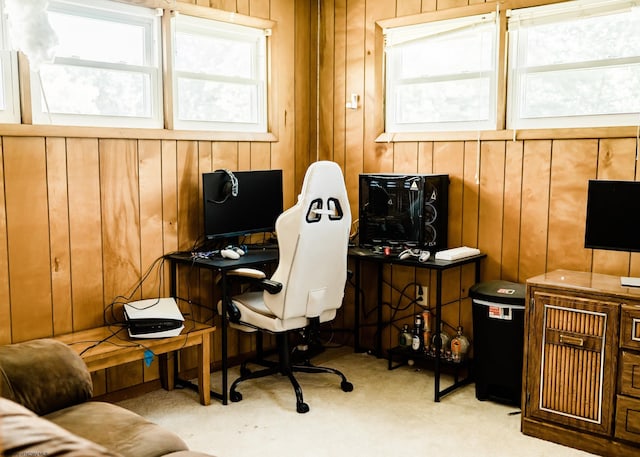 carpeted office with wood walls