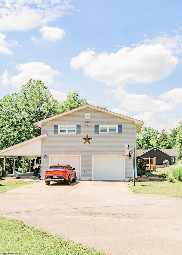 view of front of property featuring a garage