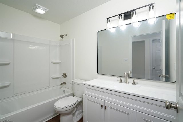 full bathroom with shower / bathing tub combination, vanity, and toilet