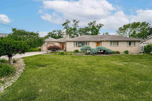 view of front of property with a front lawn