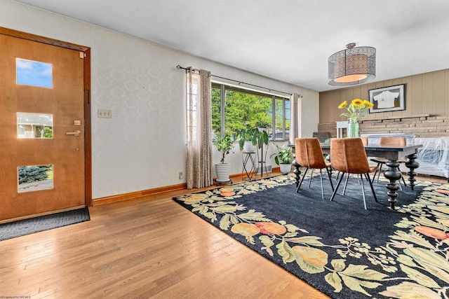 dining space with light hardwood / wood-style flooring