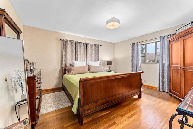 bedroom featuring light wood-type flooring