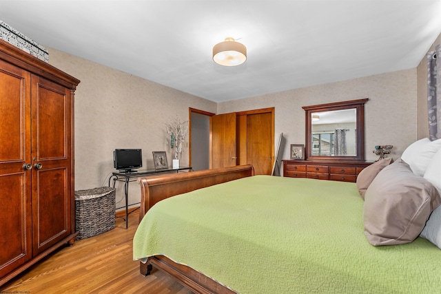 bedroom featuring light hardwood / wood-style flooring