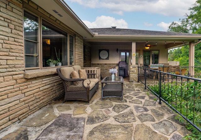 view of patio with ceiling fan