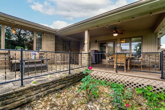 view of patio with a grill and ceiling fan