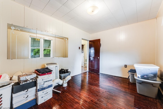 miscellaneous room with dark hardwood / wood-style floors