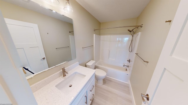 full bathroom featuring hardwood / wood-style flooring, vanity, toilet, and washtub / shower combination