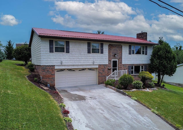 split foyer home with a garage and a front lawn