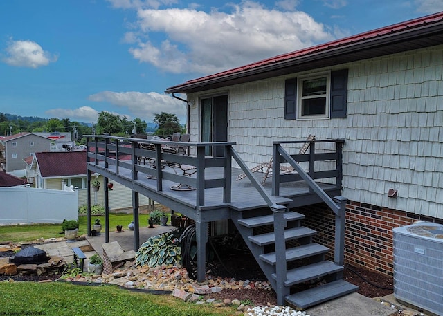 wooden deck with central AC unit