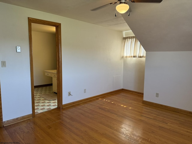 interior space with hardwood / wood-style flooring and ceiling fan