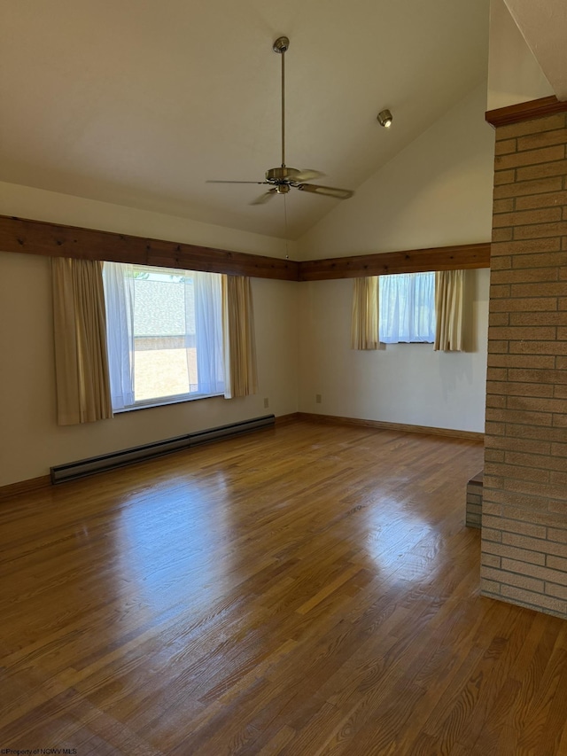 empty room with baseboard heating, ceiling fan, lofted ceiling, and hardwood / wood-style flooring