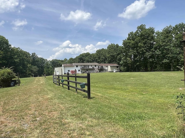 view of yard with a rural view