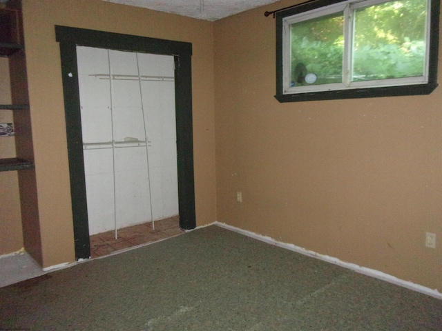 unfurnished bedroom featuring a closet