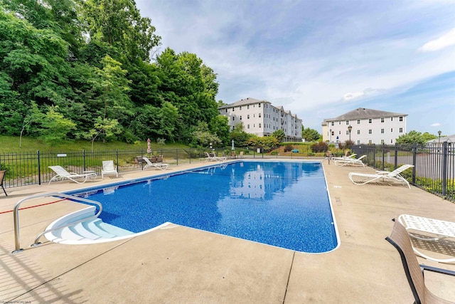 view of pool featuring a patio area