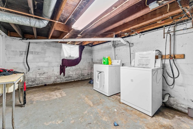 basement featuring separate washer and dryer