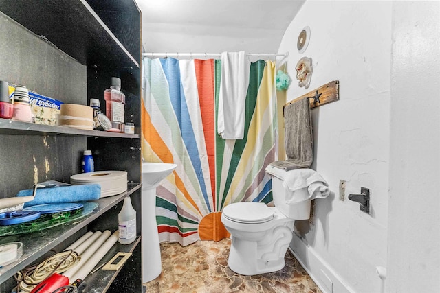 bathroom featuring toilet