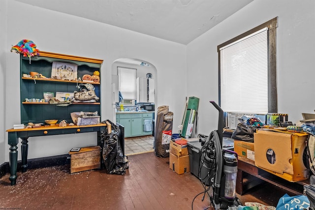 home office with cooling unit and wood-type flooring