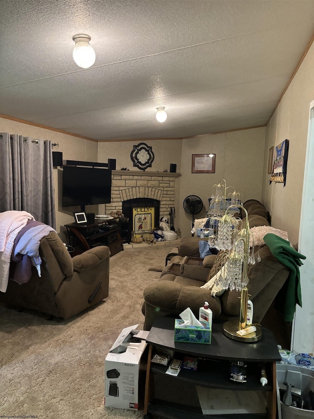 carpeted living room featuring a stone fireplace and a textured ceiling