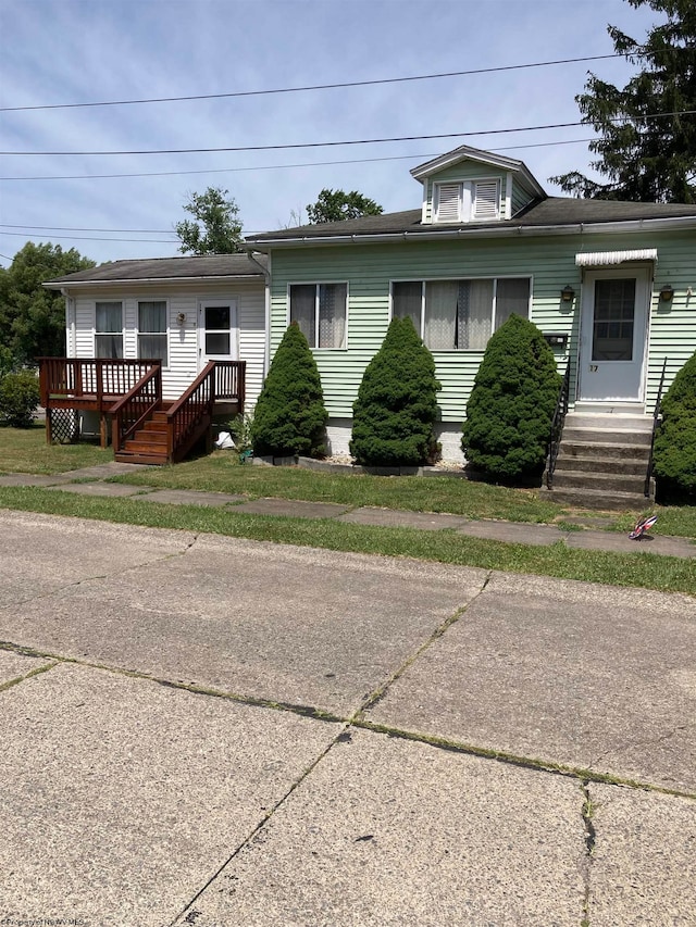 view of front of house with a deck