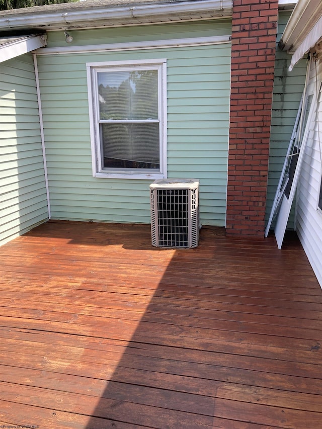 wooden terrace featuring central AC