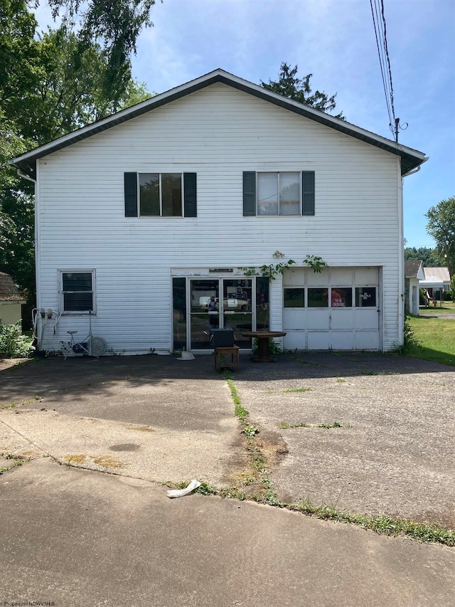 exterior space with a garage