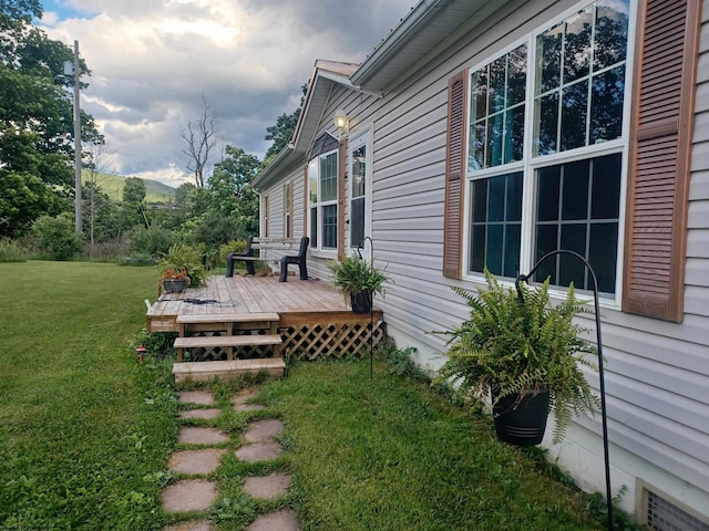 view of yard with a deck