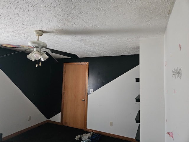 unfurnished bedroom with a textured ceiling and ceiling fan