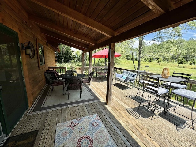 wooden terrace featuring outdoor lounge area