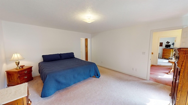 bedroom with light carpet