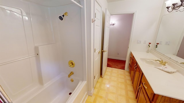 bathroom with vanity and shower / washtub combination