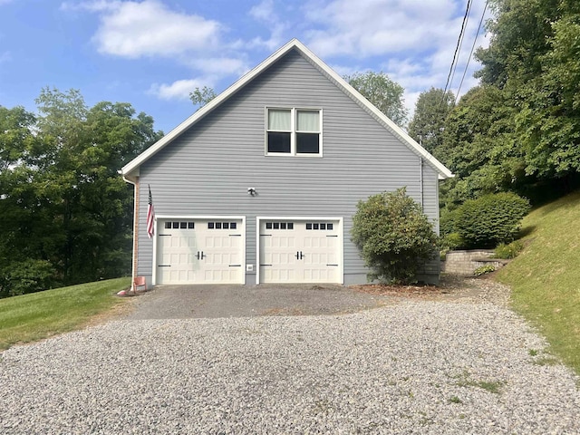 view of home's exterior featuring a garage