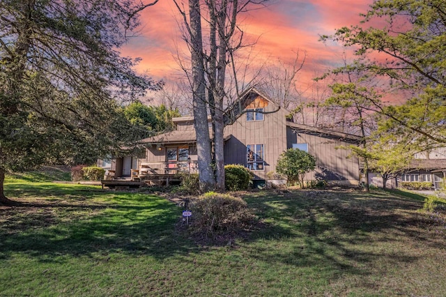 exterior space featuring a yard and a deck