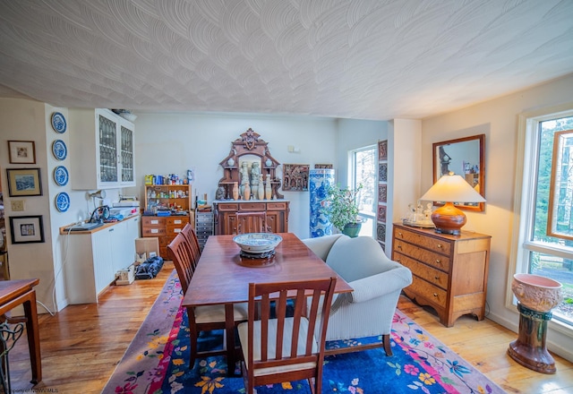 dining area with light wood-type flooring