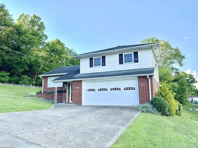 front of property featuring a front yard and a garage