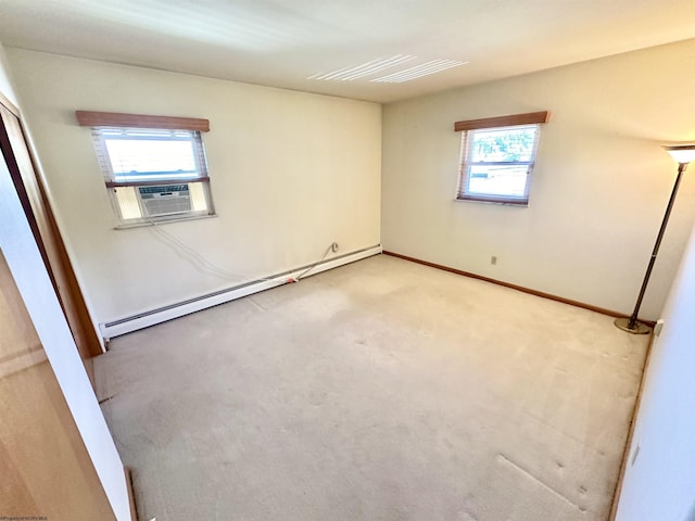 unfurnished room with light carpet, cooling unit, and a baseboard heating unit