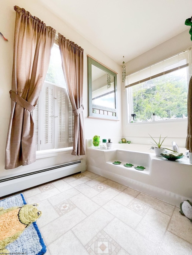 bathroom with baseboard heating and plenty of natural light