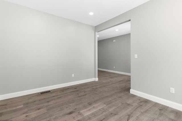 empty room featuring wood-type flooring