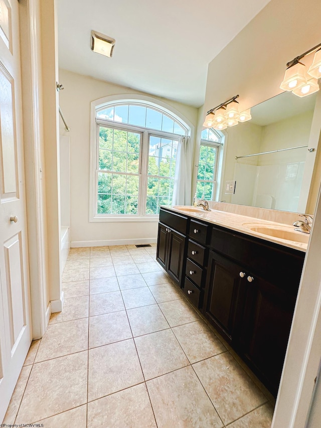 bathroom featuring tile patterned floors and vanity