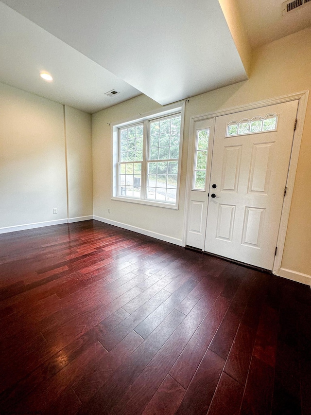 entryway with dark hardwood / wood-style floors