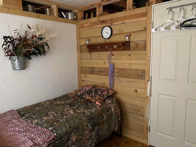 bedroom featuring wood-type flooring