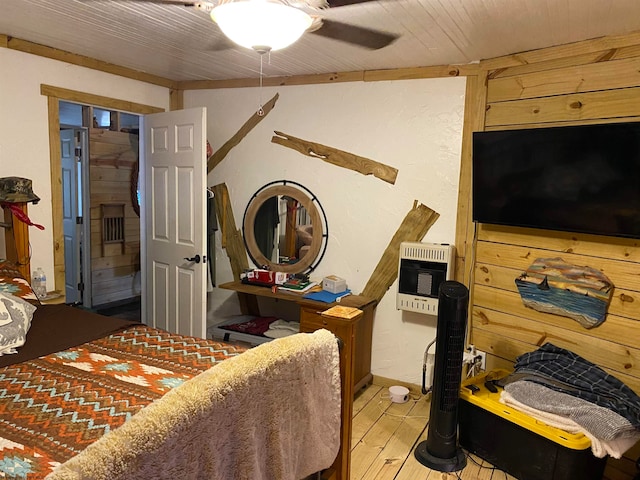 bedroom featuring ceiling fan and hardwood / wood-style flooring