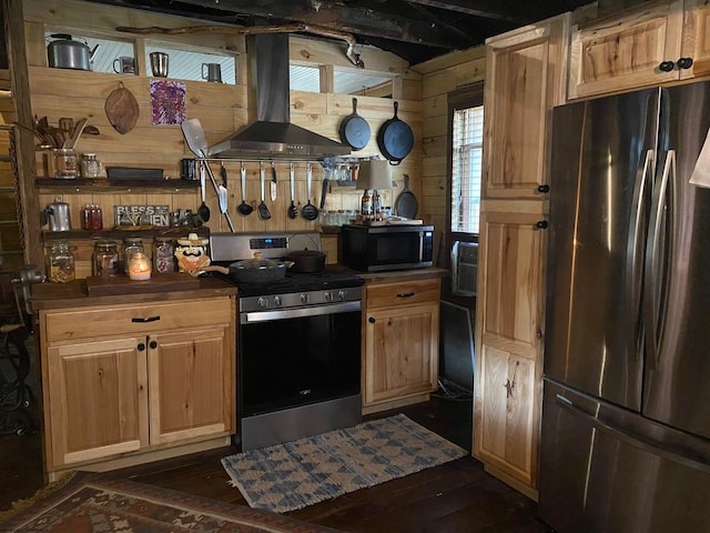 kitchen with stainless steel appliances, a wall mounted air conditioner, island exhaust hood, and dark wood-type flooring