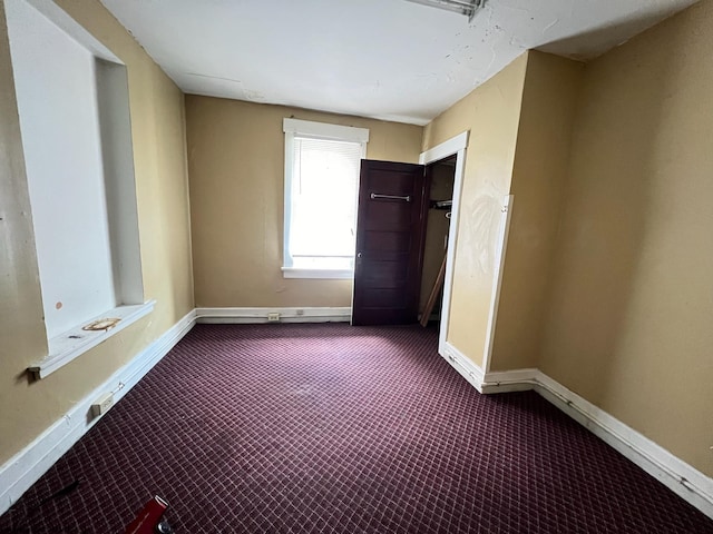 unfurnished bedroom featuring carpet flooring