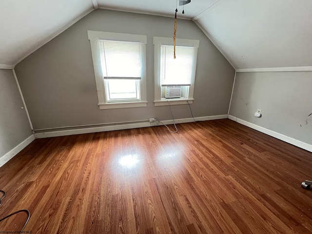 bonus room featuring lofted ceiling, wood-type flooring, and cooling unit