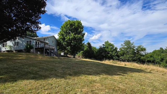 view of yard featuring a deck