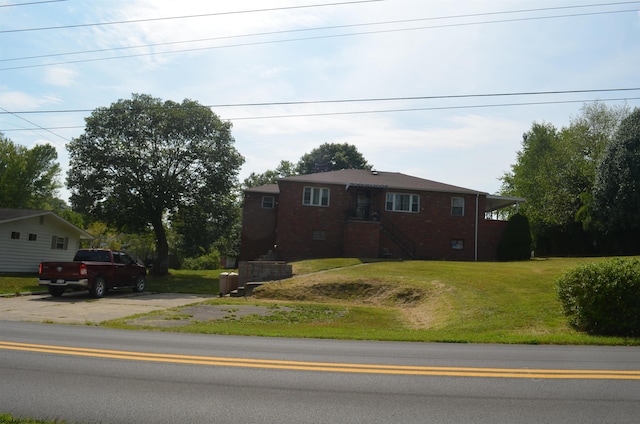 view of front of house with a front yard