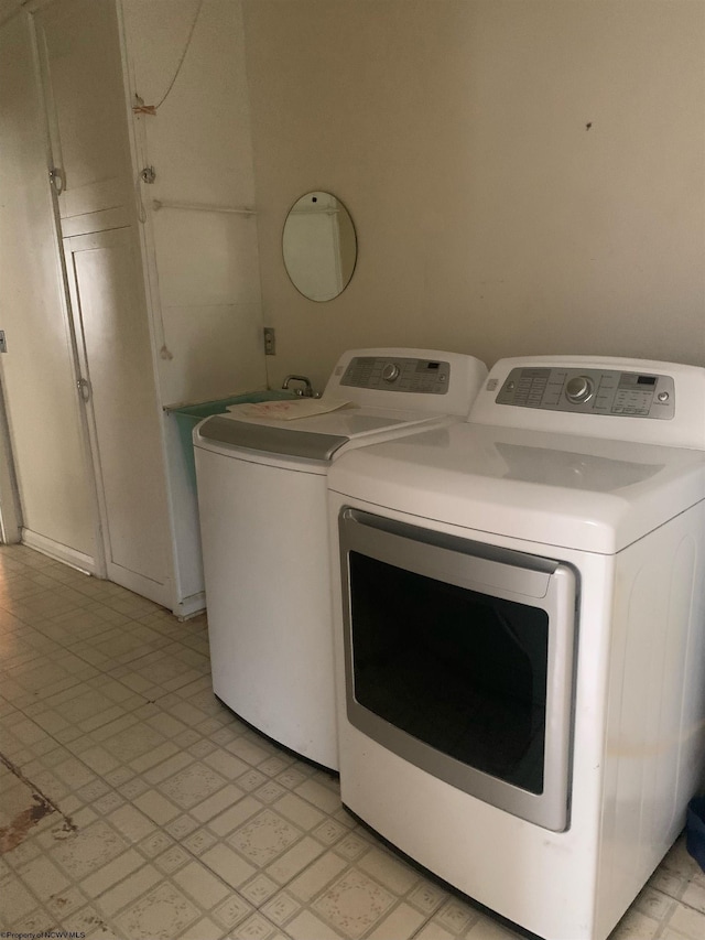 laundry area featuring independent washer and dryer