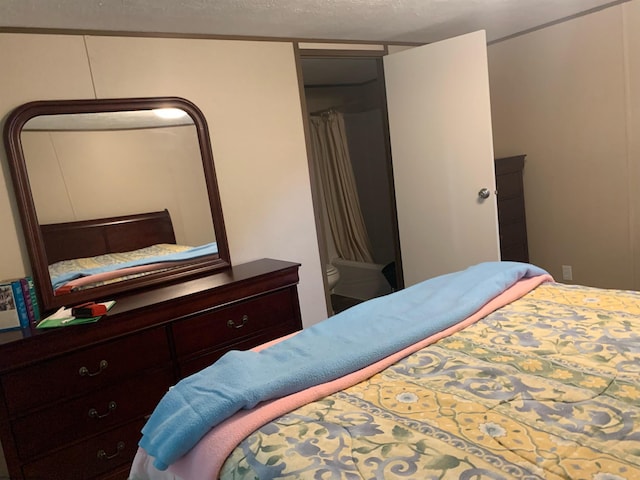 bedroom featuring a textured ceiling