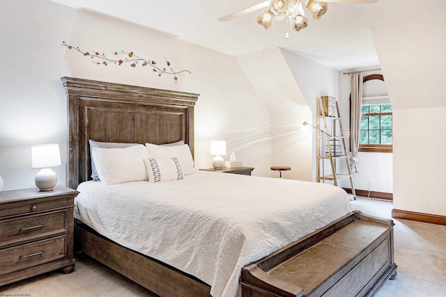 bedroom featuring ceiling fan and light carpet